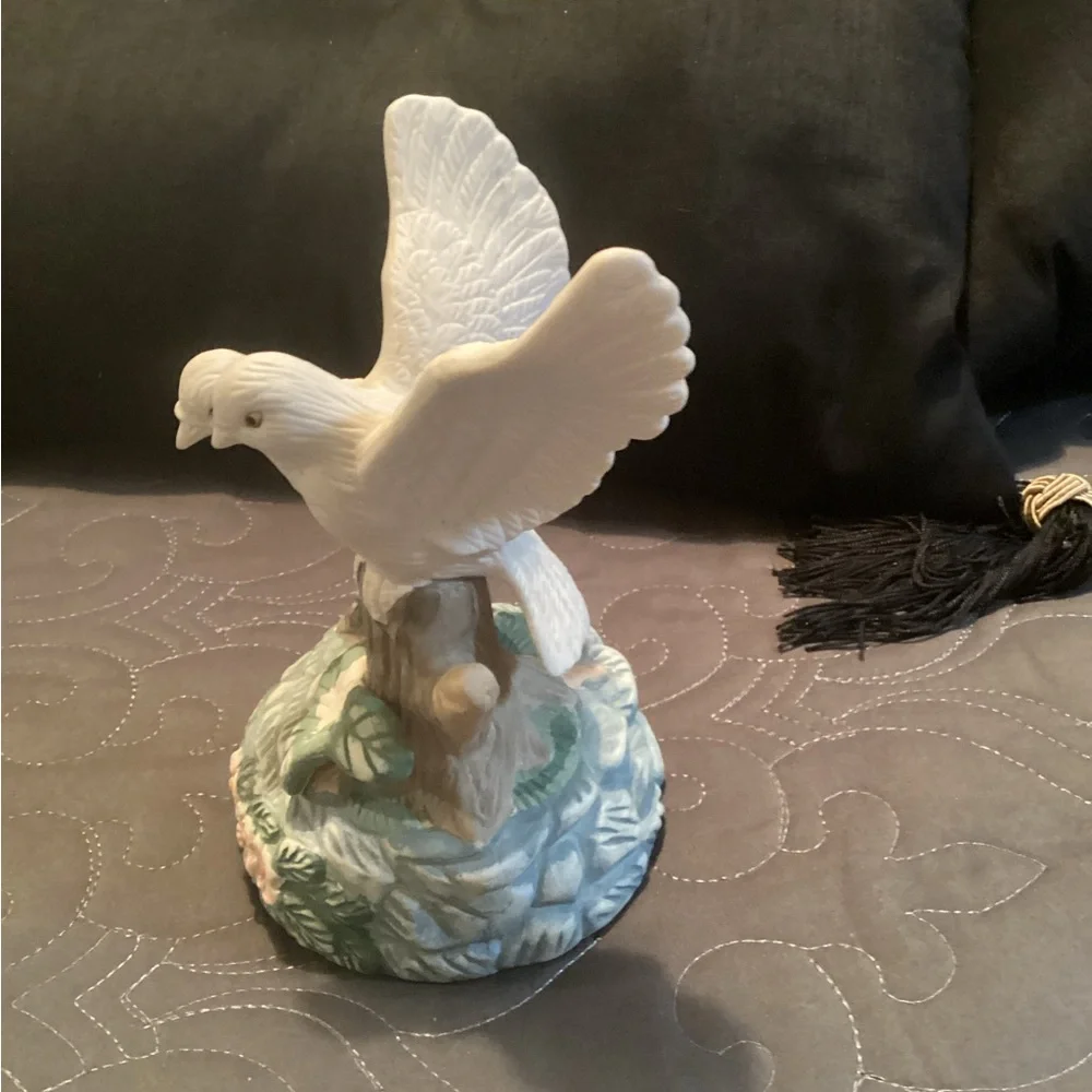 Vintage two porcelain dove figurines on a branch,